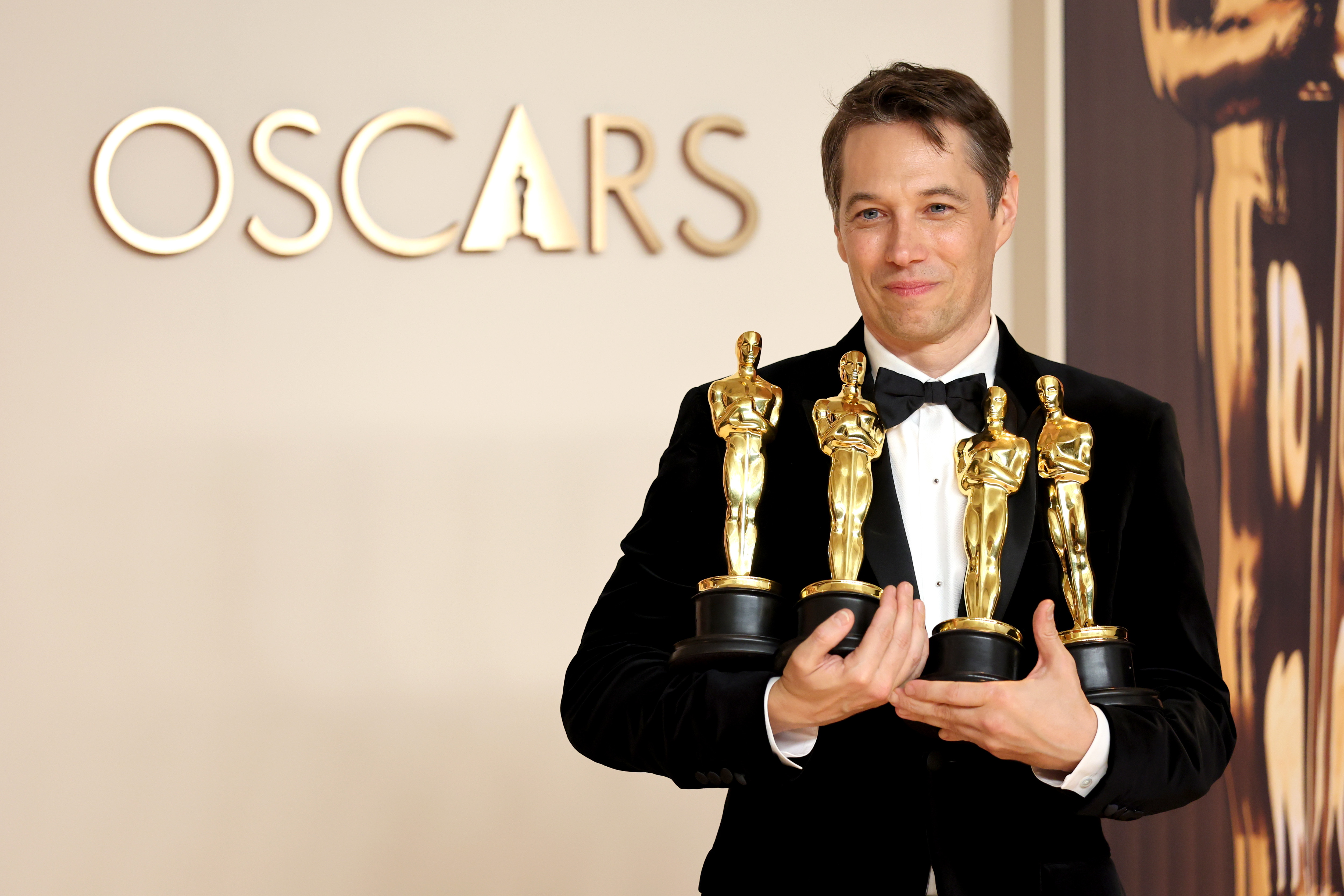 Sean Baker, who won Oscars for directing, film editing, original screenplay and best picture for <em>Anora</em>, poses in the press room during the 97th Academy Awards.