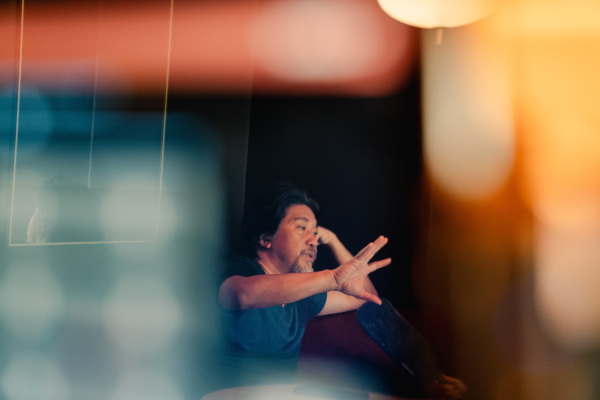 Edward Lee speaks to a reporter inside his restaurant.