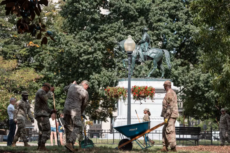 National Guard troops clear leaves and debris from McPherson Square Park in D.C. in August.