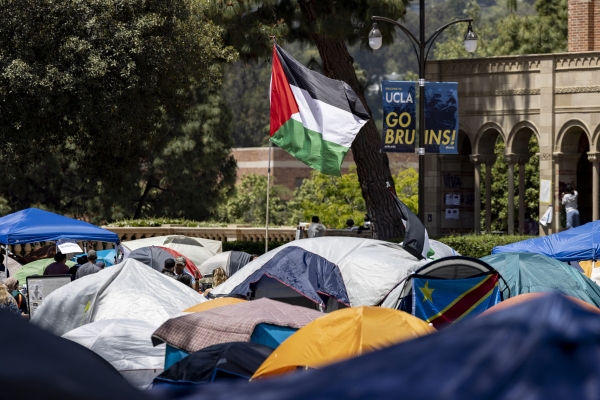 A Palestinian flag flies at a pro-Palestinian protest encampment on the campus of the University of California, Los Angeles, in May.