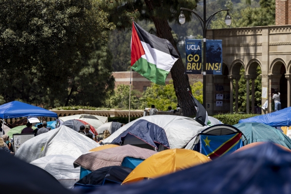 A Palestinian flag flies at a pro-Palestinian protest encampment on the campus of the University of California, Los Angeles, in May.