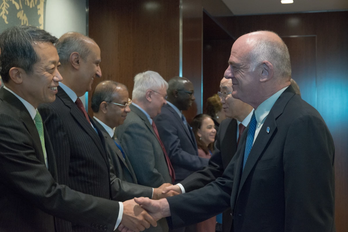 David Nabarro (front right) greets other members of the Secretary-General's corps of special advisers in 2016.