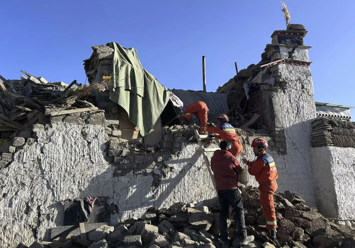 In this photo released by Xinhua News Agency, rescue workers search for survivors in the aftermath of an earthquake in Changsuo Township of Dingri in Xigaze, southwestern China's Tibet Autonomous Region on Jan. 7, 2025.