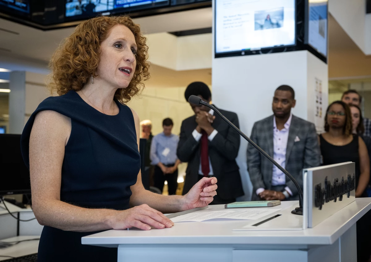 Washington Post Managing Editor Matea Gold, shown in May making remarks about the paper winning Pulitzer Prizes, is headed to the rival New York Times. Acting Post Executive Editor Matt Murray blocked publication of a story about her departure, saying the paper should not cover itself. Her decision to leave caps a year of crises for the Post involving its leadership and its finances.