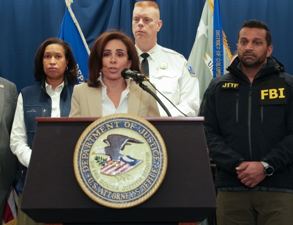 U.S. Attorney for the District of Columbia Jeanine Pirro speaks to the press Thursday about the investigation into the shooting of two West Virginia National Guard members. Looking on are Washington, D.C., Mayor Muriel Bowser (from left), D.C. Executive Assistant Police Chief Jeffery Carroll and FBI Director Kash Patel.