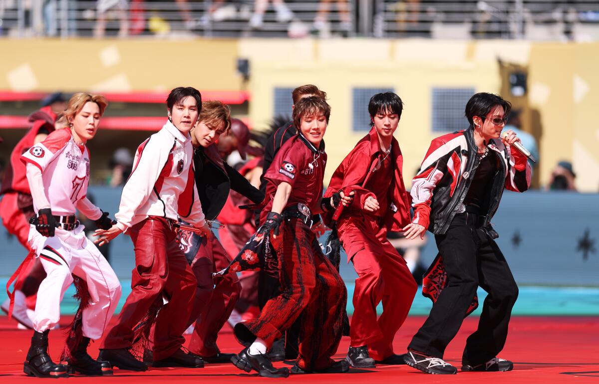 RM, Jin, Suga, J-Hope, Jimin, V and Jung Kook of BTS perform during the Topps Final Halftime Show in the FIFA World Cup 2026 Final match between Spain and Argentina at New York New Jersey Stadium on July 19, 2026 in East Rutherford, New Jersey.