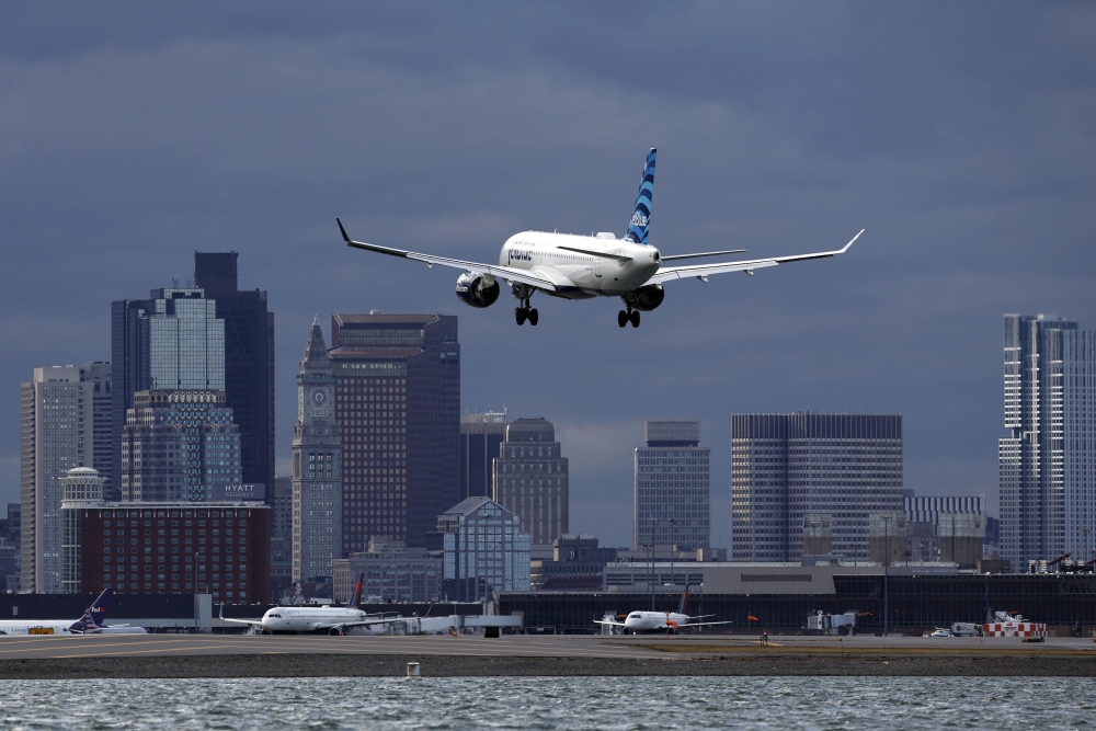 A JetBlue plane lands at Logan International Airport, Thursday, Jan. 26, 2023, in Boston. (AP)