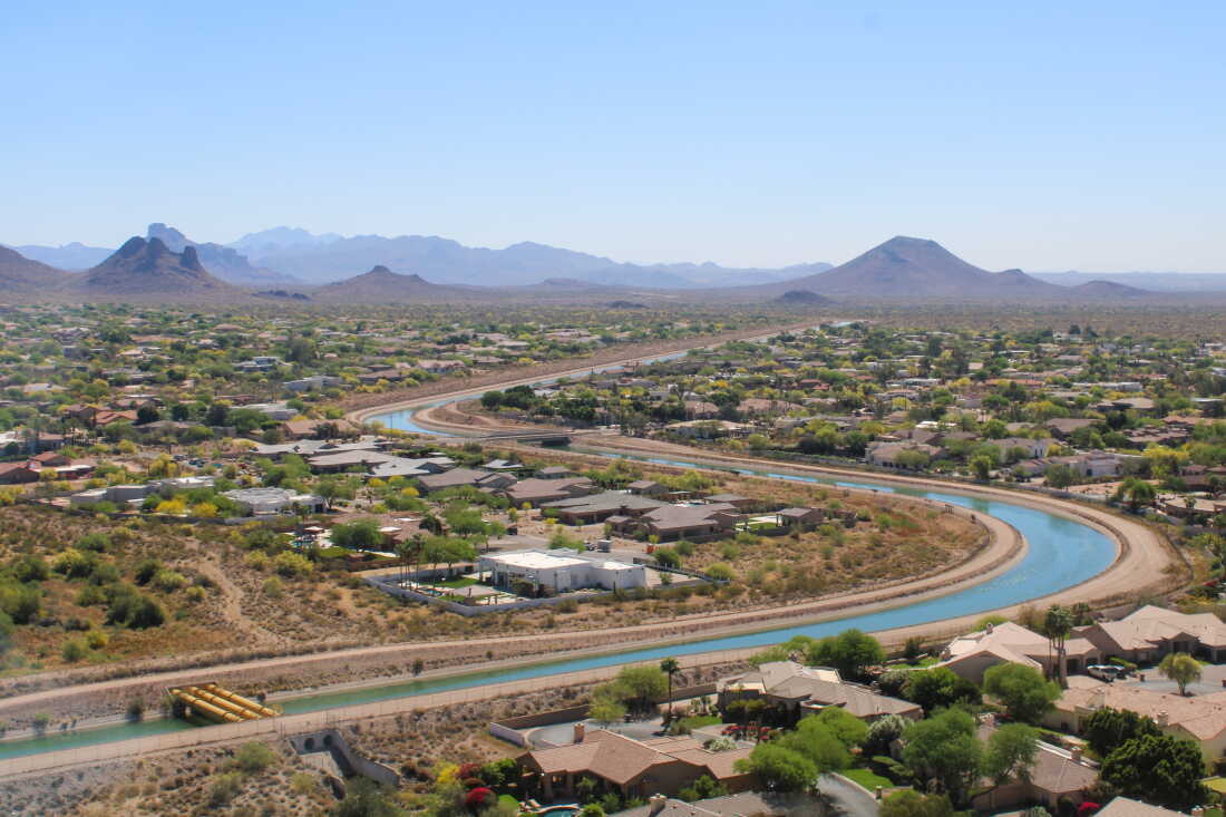 The Central Arizona Project canal winds through Phoenix on March 26, 2026. The 336-mile canal system pumps water from the Colorado River to the Phoenix and Tucson areas. Water supplies for the canal’s users will be cut under a new plan for managing the Colorado River.