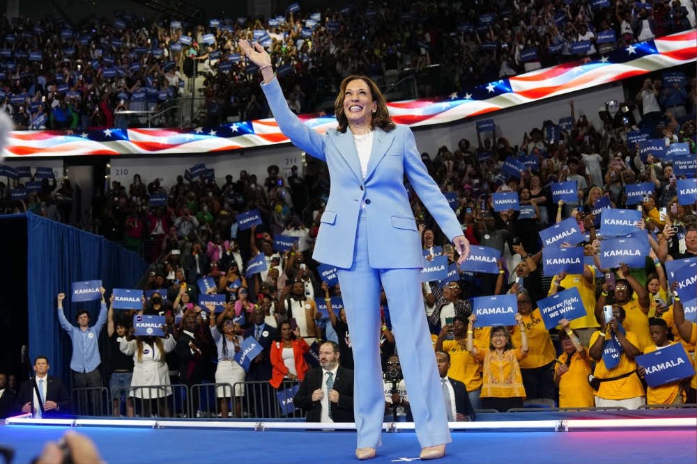 Vice President Harris waves during a packed campaign rally Tuesday in Atlanta. (AP)