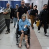 Photojournalist Heidi Levine leaves a hospital emergency room in a wheelchair in the Israeli-occupied city of Ramallah, West Bank. She's being treated after an attack by Israeli settlers as she was photographing Palestinian farmers harvesting their olives, in the Palestinian village of Abu Falah on Friday.