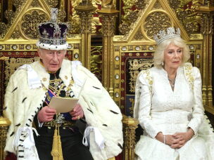 FILE - Britain's King Charles III and Queen Camilla attend the state opening of Parliament at the Palace of Westminster in London, Wednesday, May 13, 2026. (Chris Jackson/Pool Photo via AP, File)