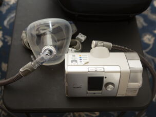 Jeff La Marca uses a machine to treat his obstructive sleep apnea. It adjusts his breathing with every breath.