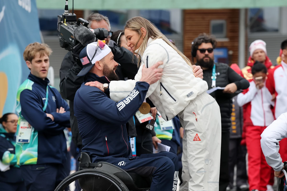 Oksana Masters celebrates with her fiancé, Aaron Pike. This was the eighth Paralympics for both of them.