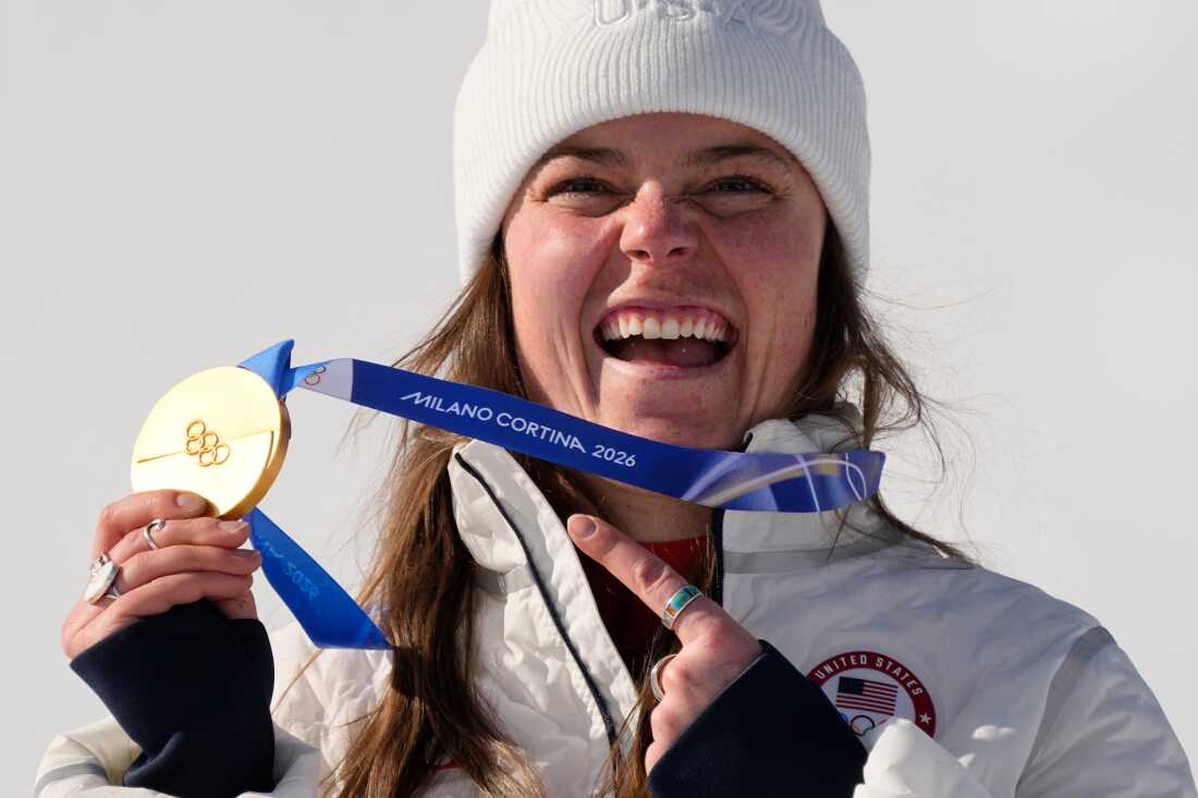 Breezy Johnson from Wyoming. shows her gold medal in the alpine ski women's downhill race, at the 2026 Winter Olympics, in Cortina d'Ampezzo, Italy, Sunday, Feb. 8, 2026. Wyoming is one of the U.S. states that punches above its weight in the Winter Games.