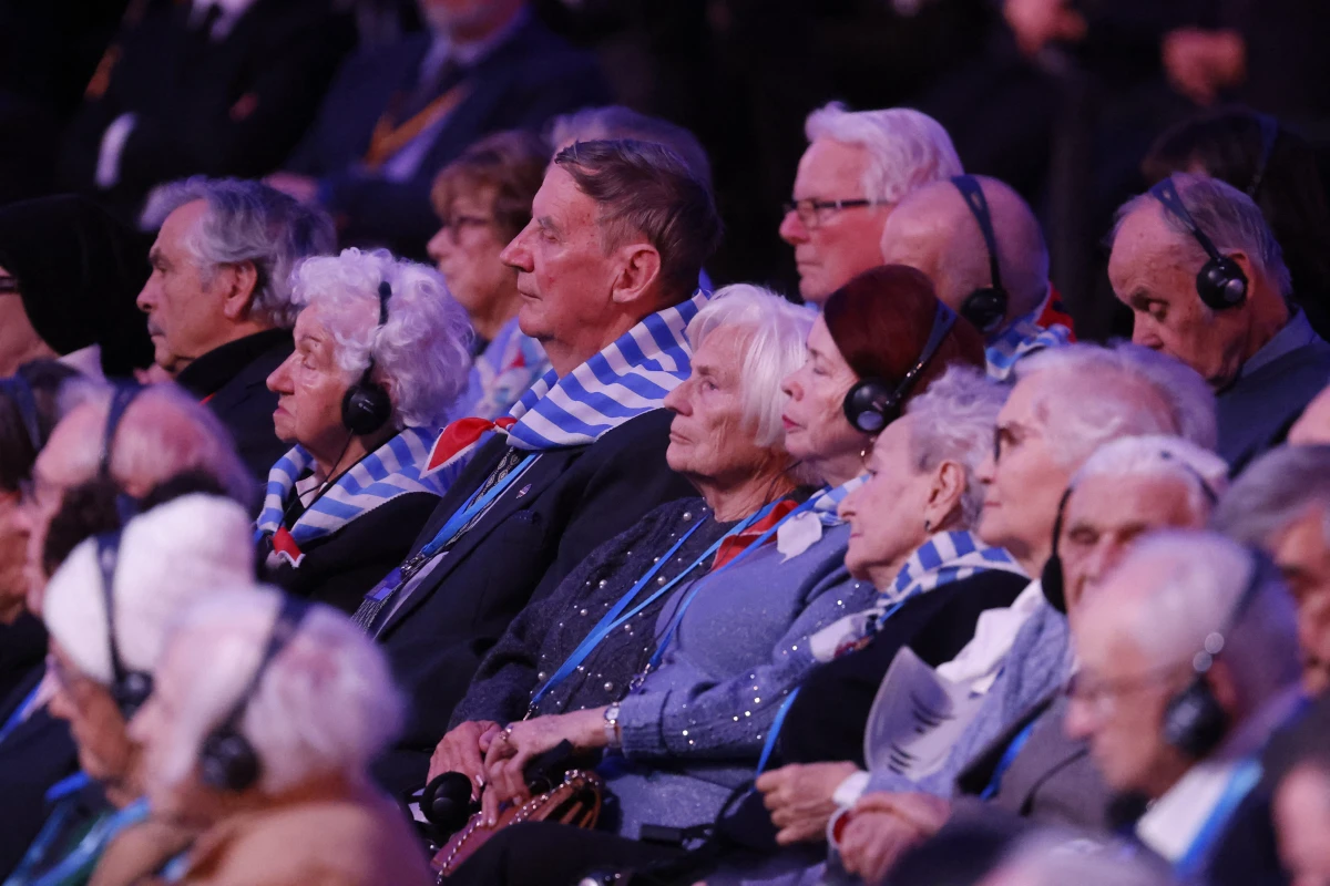 Holocaust survivors attend ceremonies commemorating the 80th anniversary of the liberation of Auschwitz-Birkenau by Soviet forces in Oswiecim, Poland, on Monday.
