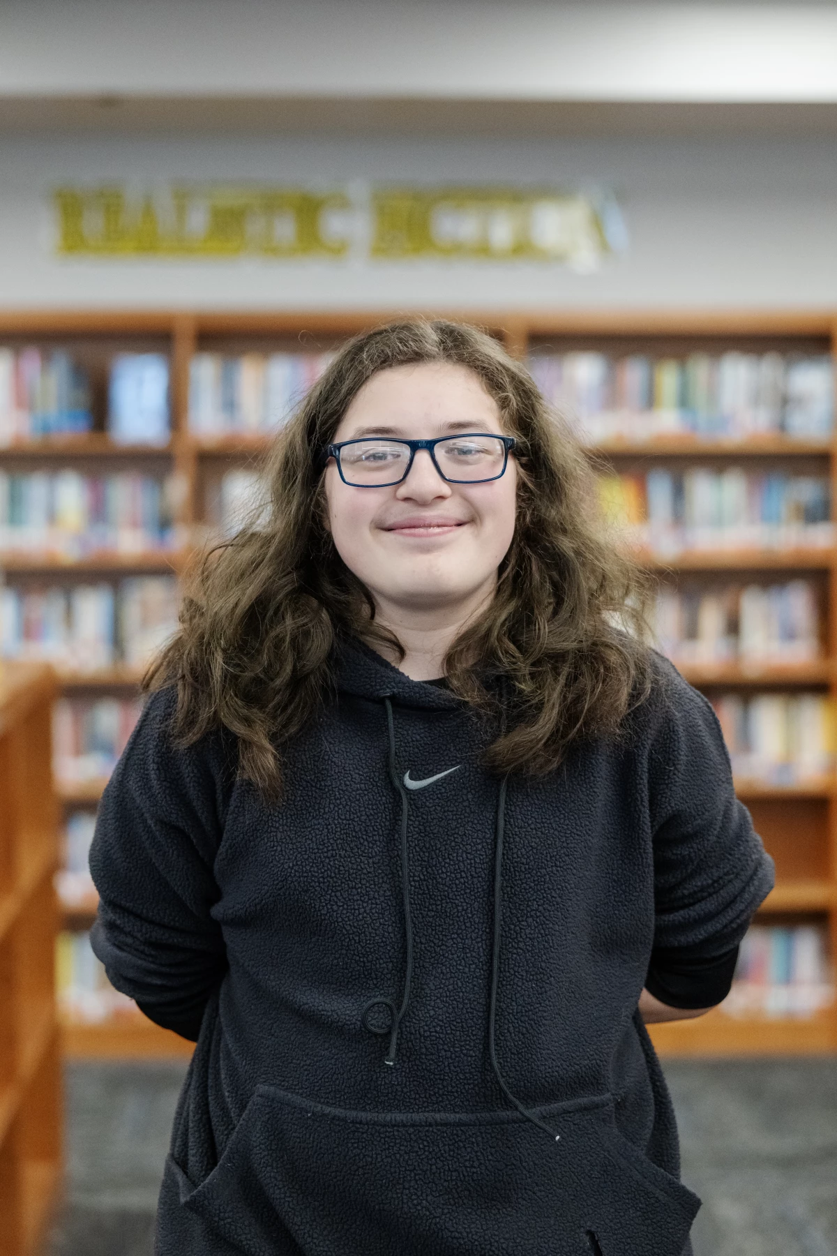Joseph Jolly, a junior at the school, says that while many students don't lock their phones in the pouches as they're supposed to, they're much less likely to have them out in class.