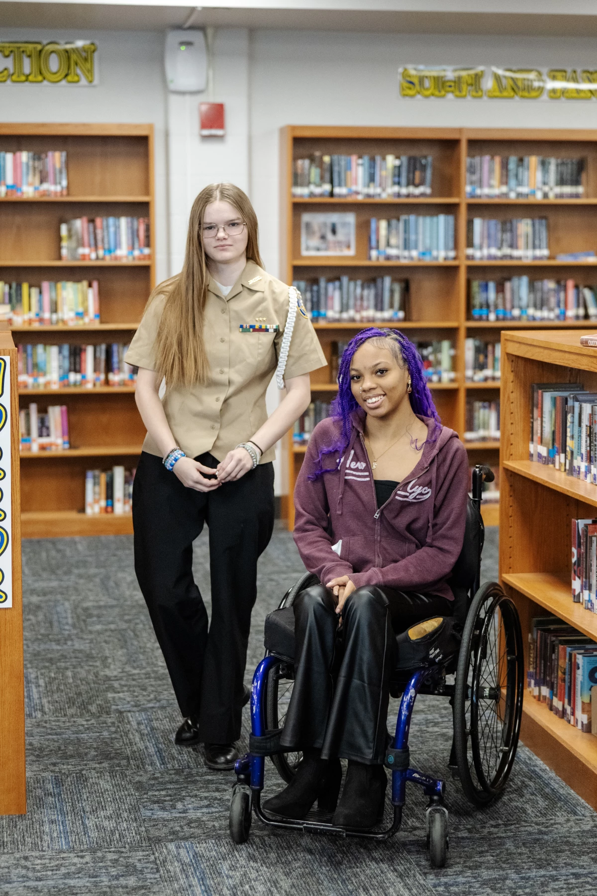 Jayden O'Neil (left) and Quani'e Lanier in the school library.