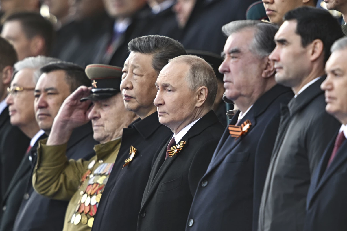 From second right: Turkmenistan President Serdar Berdimuhamedow, Tajikistan's President Emomali Rakhmon, Russian President Vladimir Putin and Chinese President Xi Jinpin watch the Victory Day military parade in Moscow, Russia, Friday, May 9, 2025, during celebrations of the 80th anniversary of the Soviet Union's victory over Nazi Germany during the World War II.