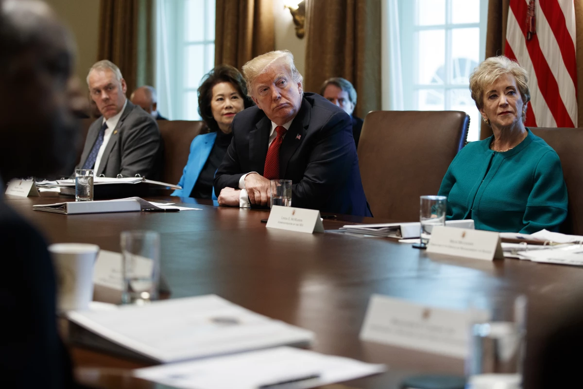 President Donald Trump participates in a cabinet meeting in 2018, during his first presidential term. At the time, Linda McMahon (right) was leading the U.S. Small Business Administration.