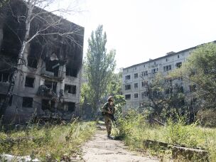 Destroyed residential buildings and the remains of the city's former Wedding Palace are seen on July 1, 2026 in Druzhkivka, Donetsk region, eastern Ukraine. Located close to the front line, Druzhkivka continues to bear the scars of Russia's ongoing invasion, with widespread destruction of civilian infrastructure shaping daily life for those who remain in the city.