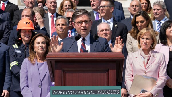 Speaker of the House Mike Johnson, R-La., and fellow Republicans celebrate GOP tax policies at an event outside the Capitol in Washington on Wednesday, April 15.