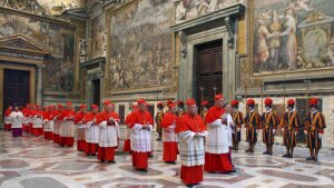 In this photo from files taken on April 18, 2005, and released by the Vatican paper L'Osservatore Romano, Cardinals walk in procession to the Sistine Chapel at the Vatican, at the beginning of the conclave.