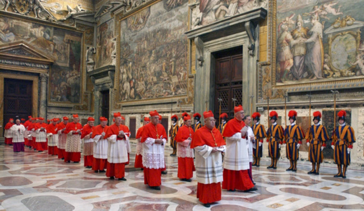 In this photo from files taken on April 18, 2005 and released by the Vatican paper L'Osservatore Romano, Cardinals walk in procession to the Sistine Chapel at the Vatican, at the beginning of the conclave.