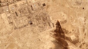 This satellite image provided by Planet Labs PBC on July 27 shows smoke rising from the Saudi Aramco oil processing facility in Abqaiq, Saudi Arabia.