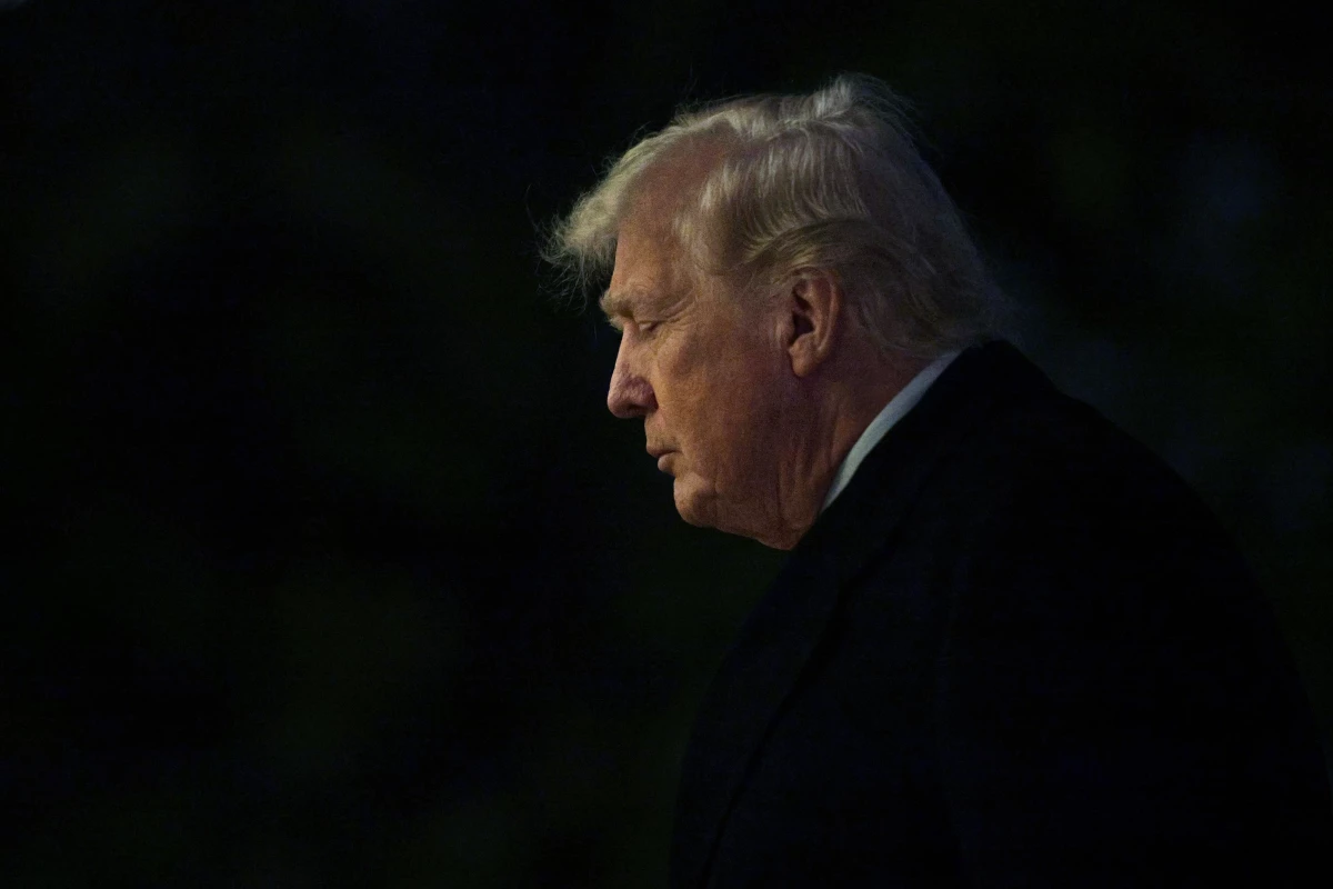 President Trump walks on the South Lawn after landing at the White House on Jan. 4, 2026. Trump returned to Washington from his winter break at the Mar-a-Lago Club in Palm Beach, Fla., one day after U.S. forces captured former Venezuelan President Nicolas Maduro and his wife in a raid on his compound in the capital city of Caracas.