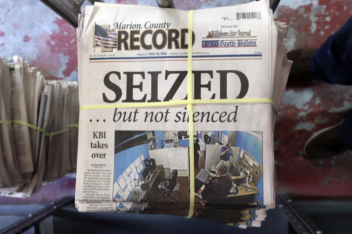 A stack of the Marion County Record sits in the back of the newspaper's building, awaiting unbundling, sorting and distribution, Aug. 16, 2023, in Marion, Kan. Two special prosecutors said on Monday that they plan to file a criminal obstruction of justice charge against a former central Kansas police chief over his conduct following a raid last year on his town's newspaper, and that the newspaper's staff committed no crimes.