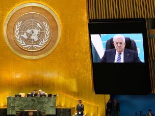 Palestinian President Mahmoud Abbas speaks via prerecorded video after being denied a visa to attend in person during the 81st session of the U.N. General Assembly at United Nations headquarters on Thursday.
