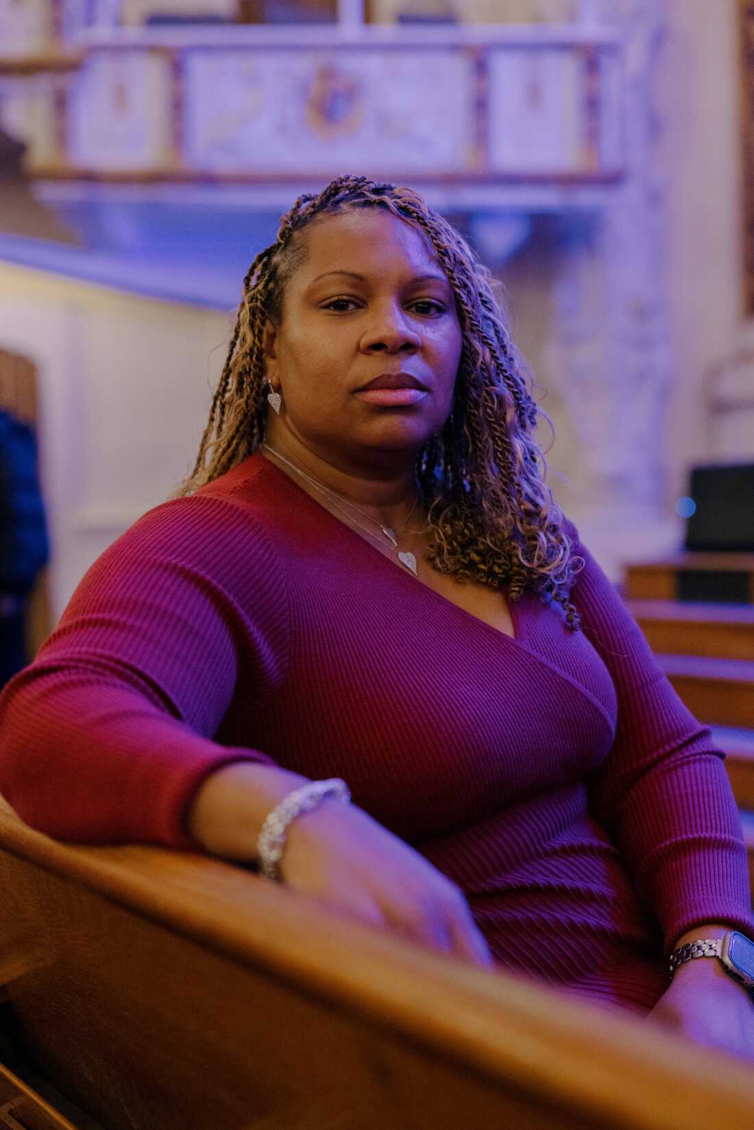 Dr. Lena Green boasts a portrait in the church of the church before the service begins.