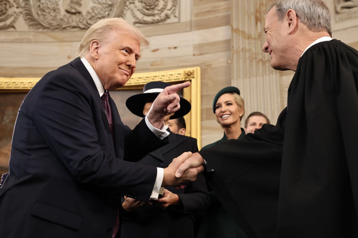 President Donald Trump gestures to Supreme Court Chief Justice John Roberts after his swearing-in ceremony in the Rotunda of the U.S. Capitol on Jan. 20.