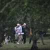 President Trump, seen touring the East Potomac Golf Links in late June.