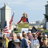 Demonstrators gathered Thursday morning to protest Trump's proposed arch, which would stand in a traffic circle on the bridge connecting the National Mall to Arlington National Cemetery.