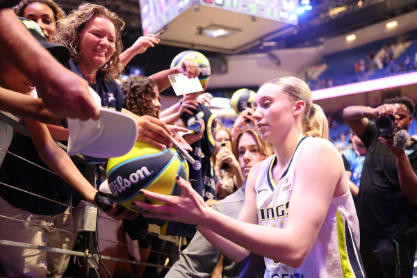 Paige Bueckers hasn't yet played a regular season game for the Dallas Wings. But the autograph of this April's top draft pick was already in demand during the preseason.