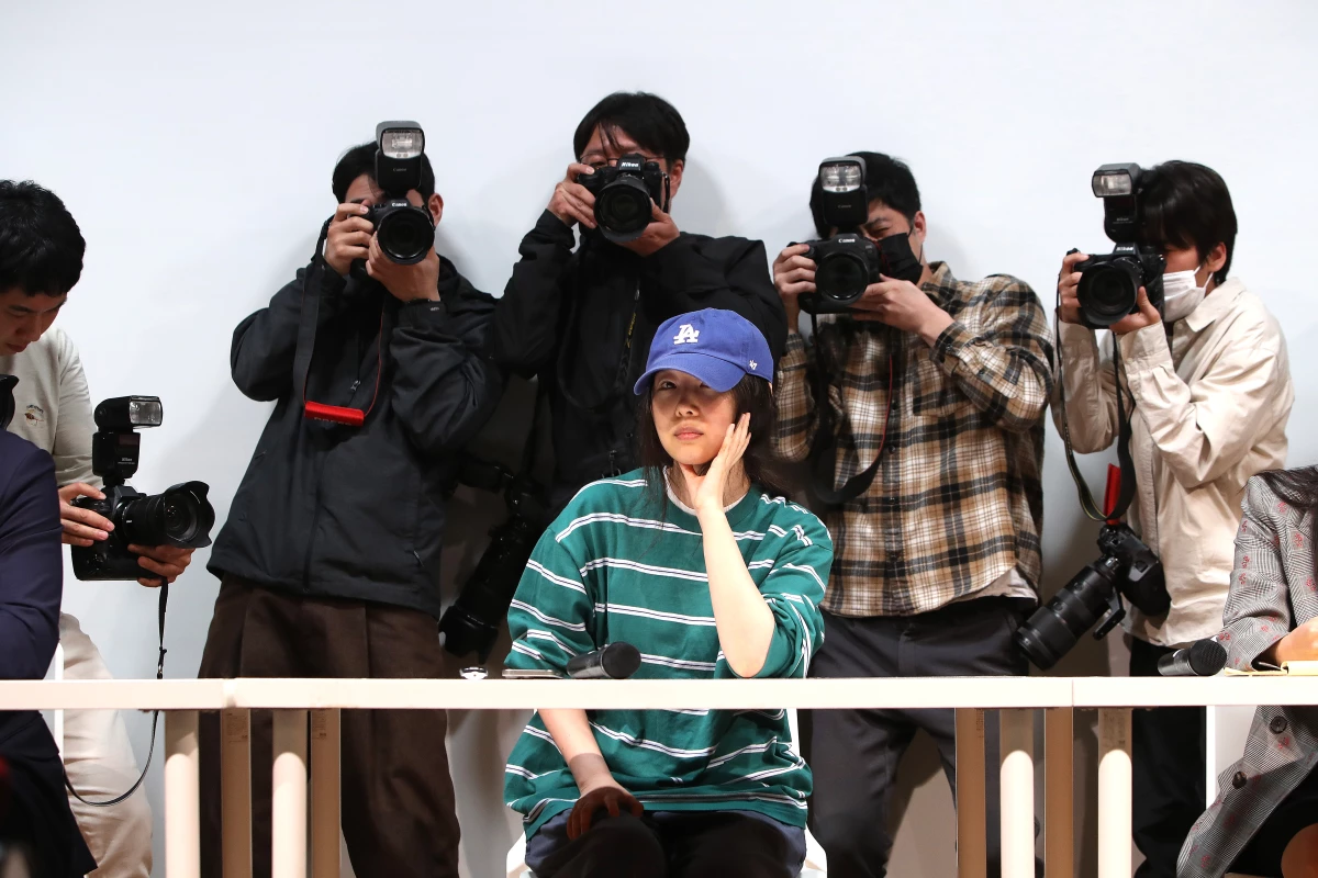 Min Hee-jin at a press conference in Seoul on April 25, 2024, addressing her dispute with HYBE after the agency alleged she had attempted a total takeover of ADOR, the sub-label she founded.