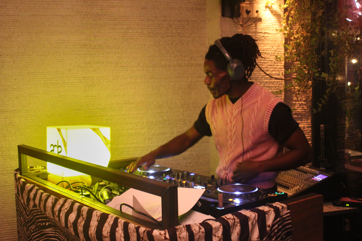 A DJ plays music at the 'Break the Silence for Sudan' fundraiser at restaurant Van De Werf, during Amsterdam Dance Event, on Oct. 22.