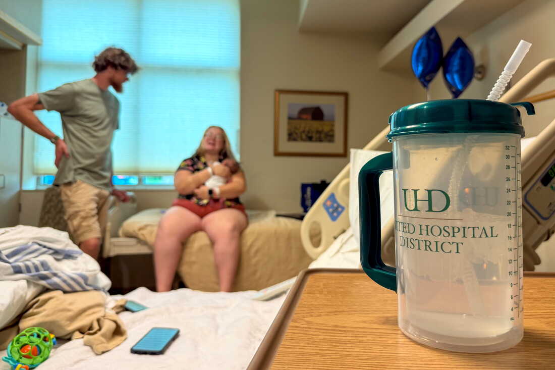 Maija Whitefeather-Manning, 28, and her husband Nick, 29, cuddle their newborn baby Corvus in their recovery room at United Hospital District in Blue Earth, Minnesota. Many rural areas have lost labor and delivery services in recent years, but United Hospital District in rural Blue Earth, Minnesota is bucking the trend.