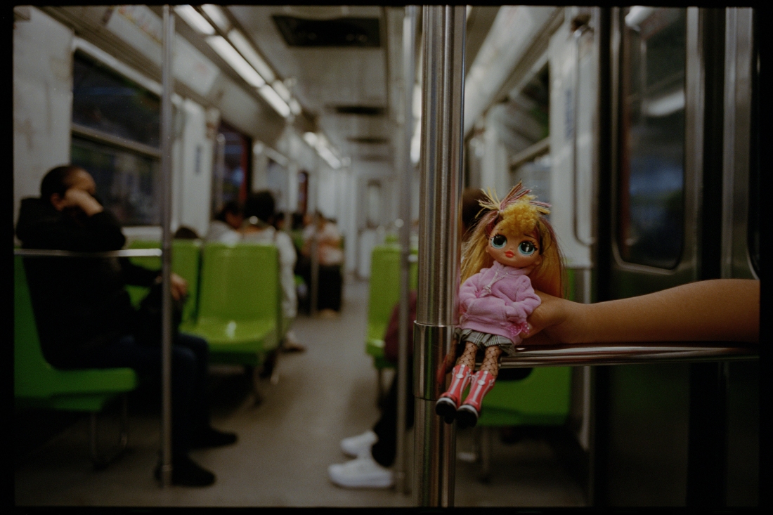 A quiet moment of a young girl’s doll in the women-only section of the metro in November 2023.