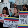Laura Kelley, Miami-Dade County Democratic Party Chair, (second from the left) joins others to support a resolution in favor of reinstating temporary protected status for Venezuelans in February in Miami.