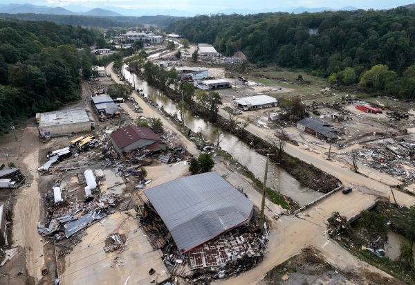 An aerial view of flood damage wrought by Hurricane Helene along the Swannanoa River on October 3, 2024 in Asheville, N.C. At least 200 people were killed in six states in the wake of the powerful hurricane which made landfall as a Category 4.