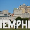 A woman takes a selfie in front of the Memphis, Tenn., skyline on Sept. 29.