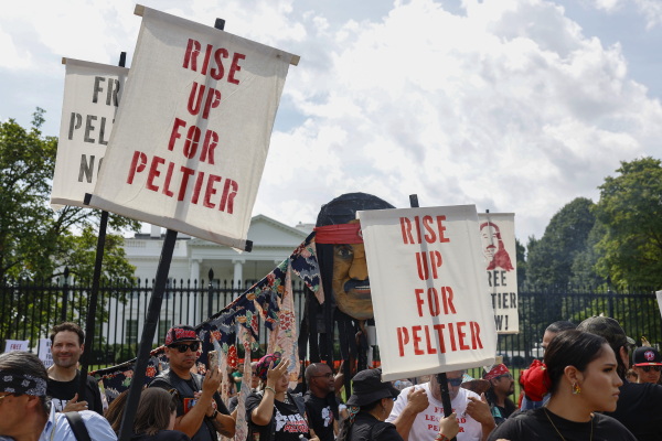 Activists participate in a protest to urge U.S. President Joe Biden to grant Leonard Peltier clemency outside of the White House on September 12, 2023.
