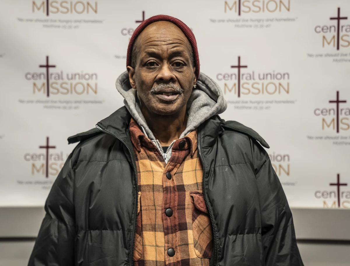 Charles Adams says he has been without stable housing for 2 1/2 years. He volunteers his time at the shelter.