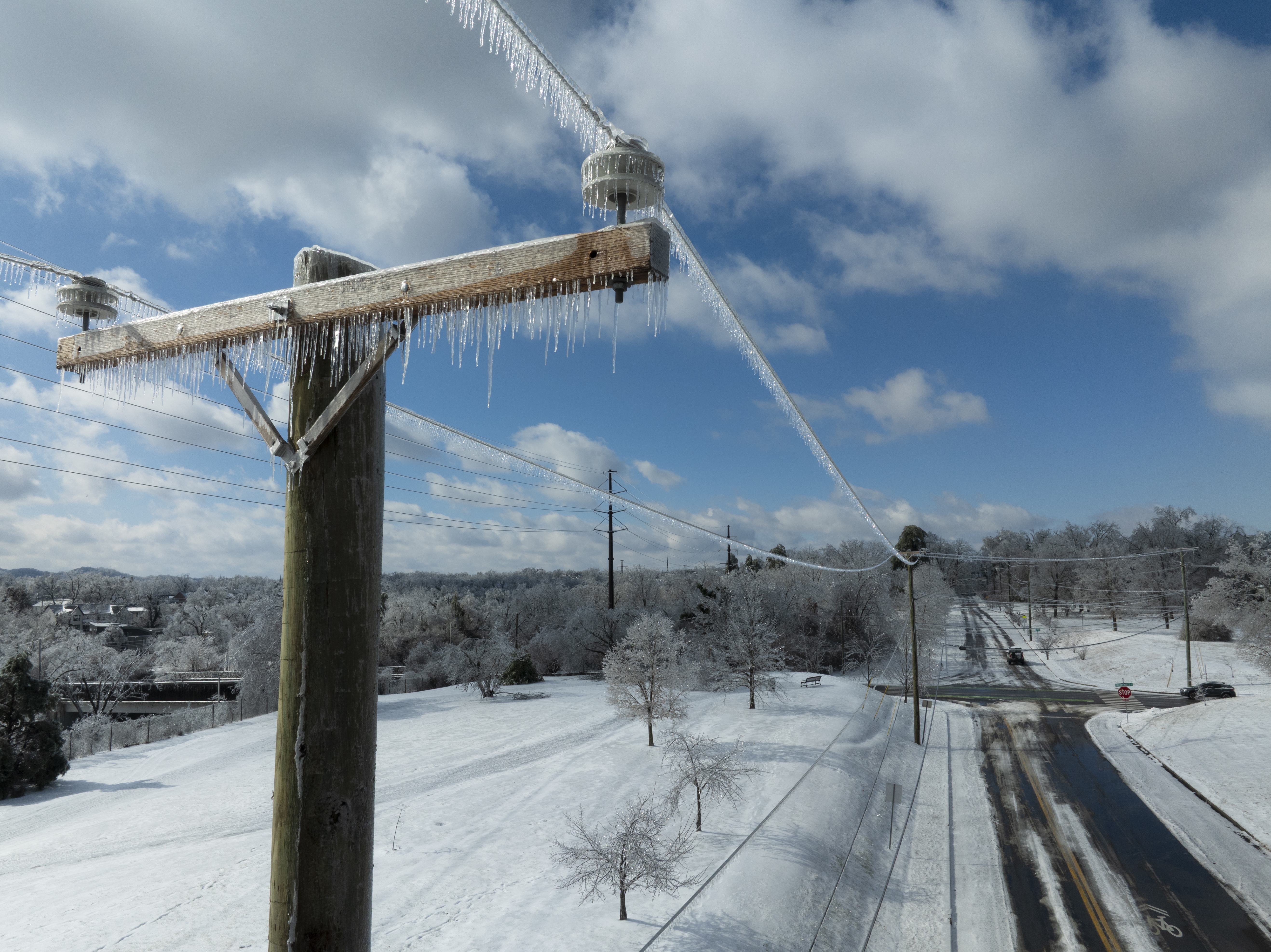In this aerial view, ice accumulates on utility lines Monday in Nashville, Tenn. A massive winter storm is bringing frigid temperatures, ice, and snow to tens of millions of Americans across the nation.