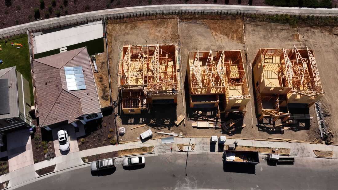 In an aerial view, homes are seen under construction at a new housing development on July 01, 2025 in Richmond, California. According to a report by the U.S. Commerce Department's Census Bureau, U.S. construction spending fell 0.3% in May as higher mortgage rates and rising inventory impacted single-family housing projects. (Photo by Justin Sullivan/Getty Images)