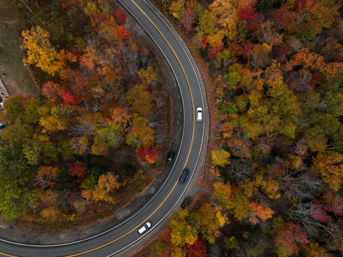 A view of fall foliage in Vermont and New Hampshire in mid-October 2024. Leaves start changing in different locations across the U.S. in September and October based on factors like temperature, elevation and rainfall.
