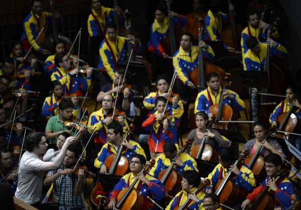 As Venezuela's future remains uncertain, its symphony orchestra reaches a new milestone
