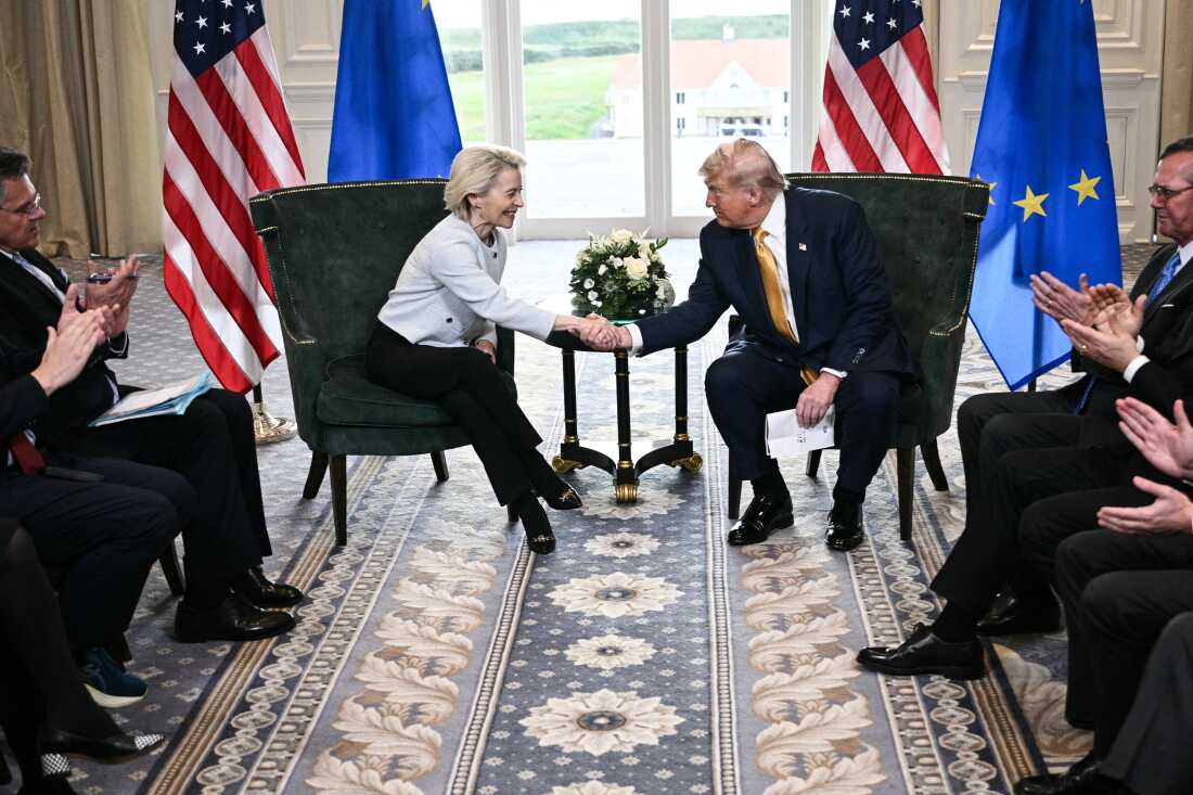 President Trump shakes hands with European Commission President Ursula von der Leyen at his golf resort in Turnberry, Scotland, where the two leaders agreed to a trade deal.